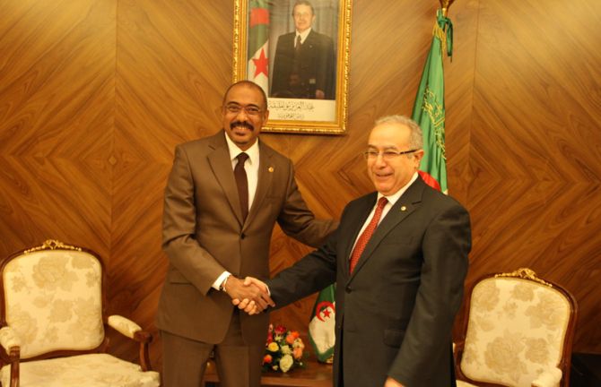 UNAIDS Executive Director Michel Sidibé and the Algerian Minister of Foreign Affairs Ramtane Lamamra.  Algiers, November 2014.