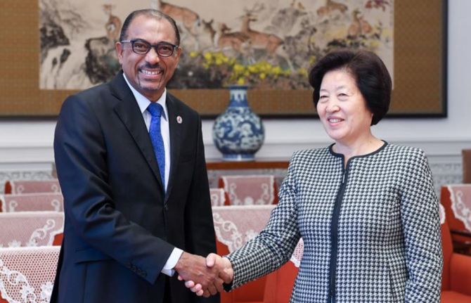 Chinese Vice Premier Sun Chunlan (R) meets with Michel Sidibé, UN under-secretary-general, and UNAIDS executive director, in Beijing, capital of China, June 20, 2018. (Xinhua/Chen Yehua)