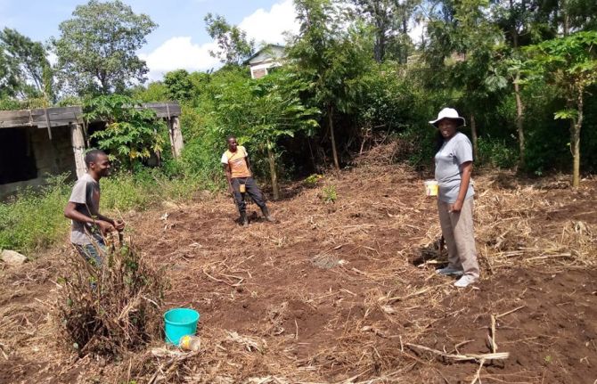 Ms Ringera thinks that sustainability is key— she and her team are planting crops while keeping distance at the time of COVID-19.