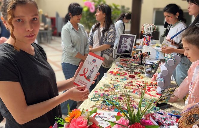 Elina at the “Miracle Time” charity fair, where children living with HIV present their handicrafts. May, 2023 Tashkent, Uzbekistan