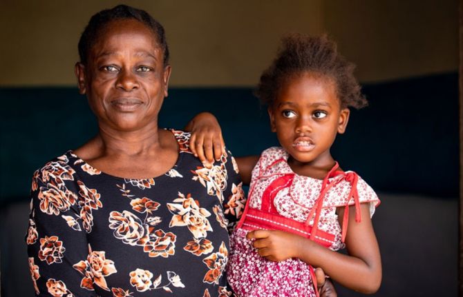 Caroline Damiani, and her granddaughter Nancy Saidi, at her home. Temeke, Dar es Salaam, Tanzania, 13 November 2020. Credit: UNAIDS/Daniel Msirikale