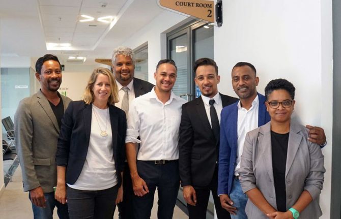 Abdool Ridwan Firaas (Ryan) Ah Seek, third from right, the plaintiff; with members of Collectif Arc-En-Ciel at the Supreme Court in November 2021. COurtesy of Human Dignity Trust